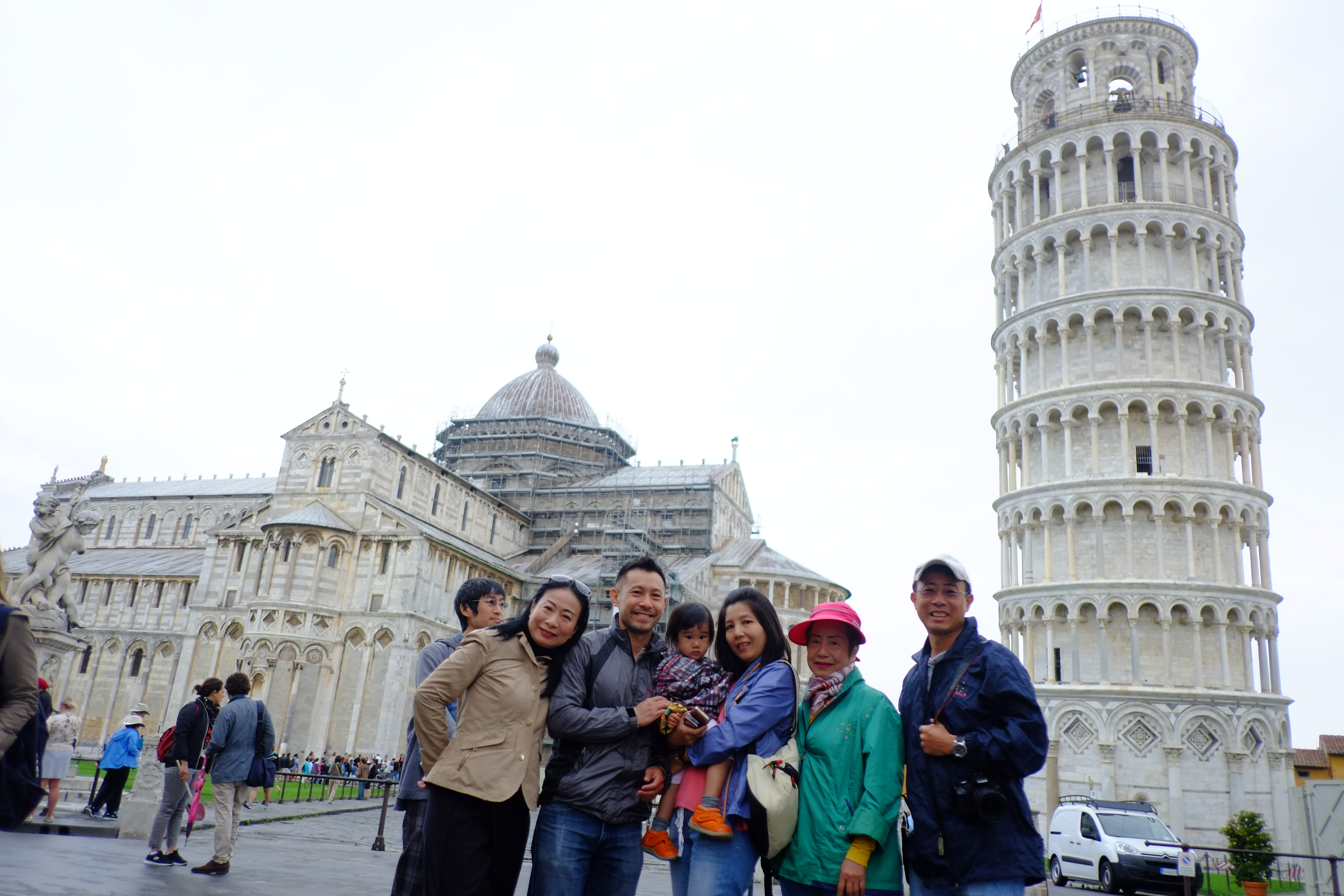 Family at the Leaning Tower of Pisa, Italy